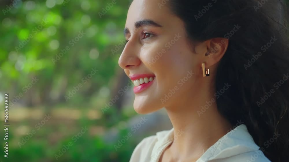 Beautiful young woman with happy expression at tree background. Lifestyle, Travel, Happiness, Nature, Wellbeing, Vacation, Summer, Expression, Enjoyment and Environment concept. Beautiful young woman with happy expression at tree background. Lifestyle, Travel, Happiness, Nature, Wellbeing, Vacation, Summer, Expression, Enjoyment and Environment concept.