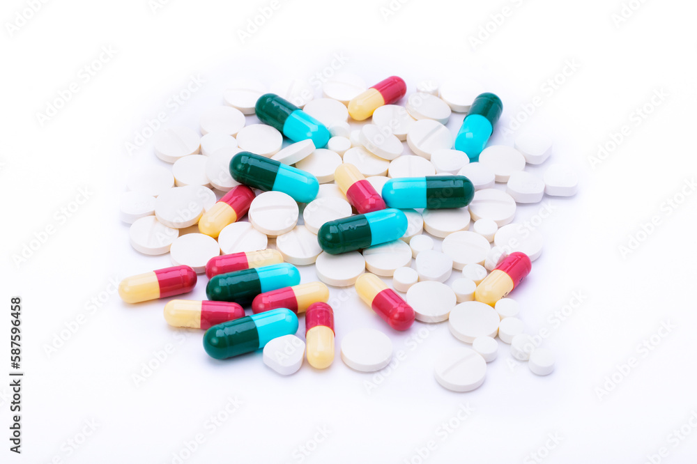 colorful pills with capsules and pills isolated on white background