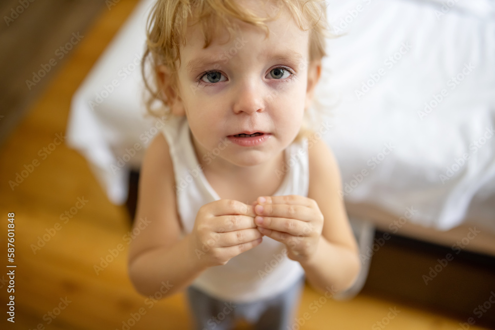 Cute little blond child is crying. Crying child, stress, pain, sadness, despair Cute little blond child is crying. Crying child, stress, pain, sadness, despair
