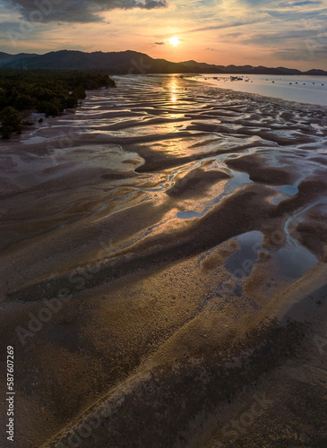 Aerial view of beautiful sand waves texture with reflection of sunset on Koh Yao Yai island  Phang nga  Thailand