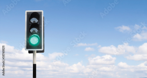 Foto Junction traffic light with green bright open to start, running and go a head, o