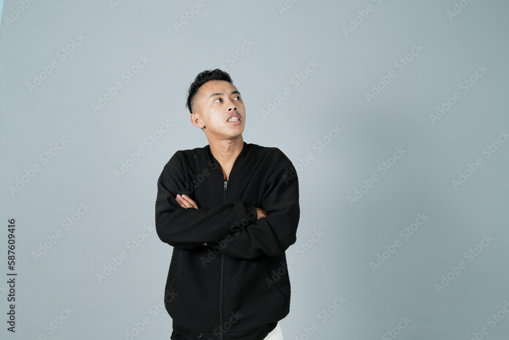 a young man wearing a black shirt a young man wearing a black shirt