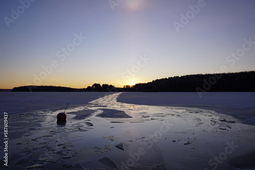 Dusk over a frozen lake