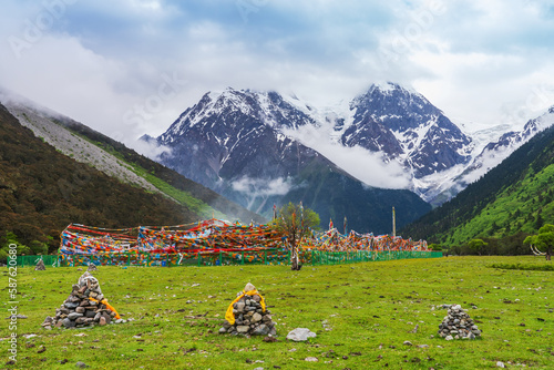 Meili Snow Mountains and Grassland Pastures in Nyingchi, Tibet Autonomous Region, China  on June 11, 2022 photo