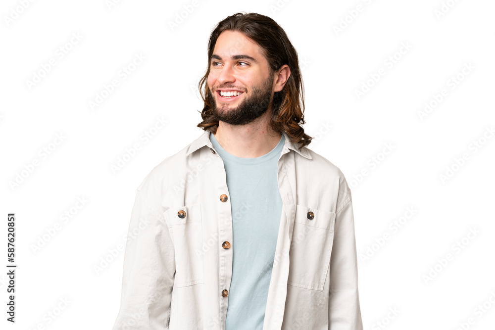 Young handsome man over isolated chroma key background looking to the side and smiling Young handsome man over isolated chroma key background looking to the side and smiling