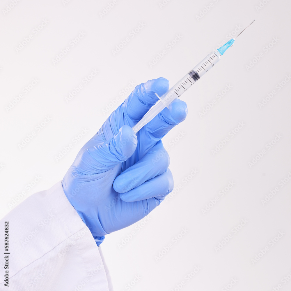 Healthcare, hand and doctor with vaccine, injection or shot in studio against a white background. Medicine, vaccination and man health expert with needle for medical, innovation or disease treatment Healthcare, hand and doctor with vaccine, injection or shot in studio against a white background. Medicine, vaccination and man health expert with needle for medical, innovation or disease treatment