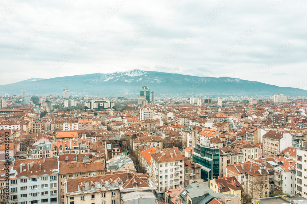 Sofia cityscape main streets and old city district with Vitosha mountain view. Travel to Bulgaria concept aerial view panorama