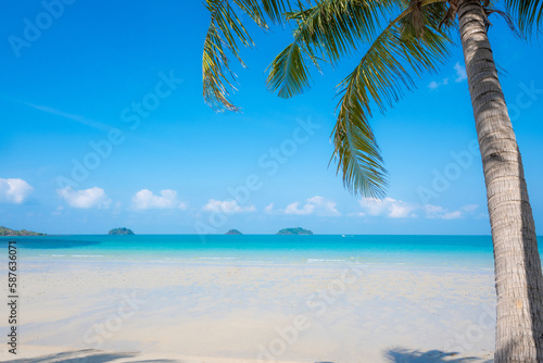 Summer and white sand beach, blue water. © TWEESAK