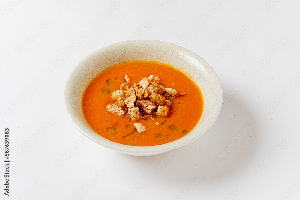 tomato soup with croutons on the white tomato soup with croutons on the white