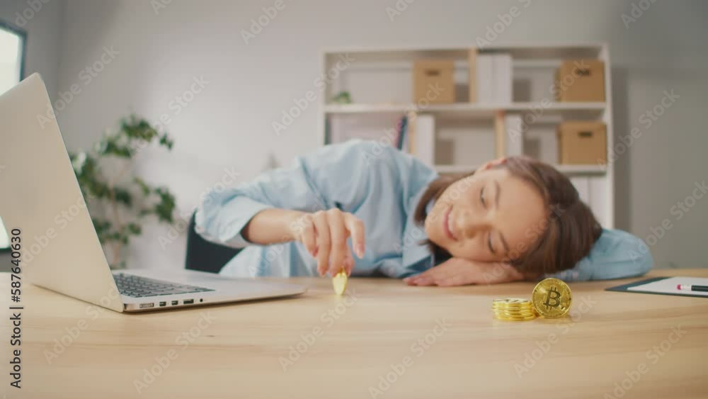 Female Young Woman Freelance plays with Gold BTC Coin at Home. Woman Stock Trader Earning Bitcoins After Online Monitoring Trading Operations. Increasing Wealth Financial Prosperity. Female Young Woman Freelance plays with Gold BTC Coin at Home. Woman Stock Trader Earning Bitcoins After Online Monitoring Trading Operations. Increasing Wealth Financial Prosperity.