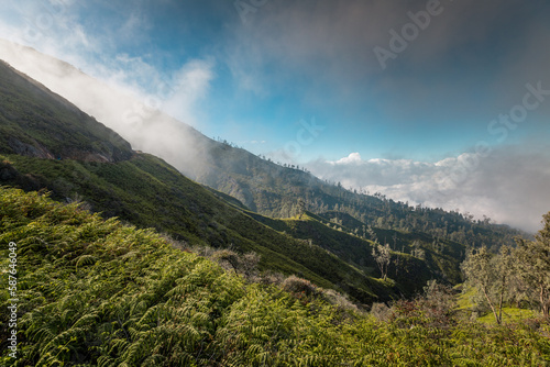 Amazing volcanic landscape of Ijen complex during sunrise, Java, Indonesia photo