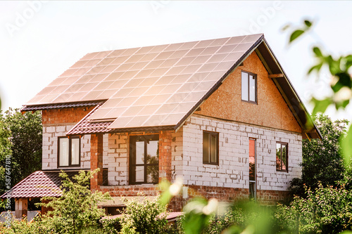 Wallpaper Mural Solar Panels on Roof of Private House in Countryside. Eco House with Landscaping Garden, Solar Panel Roof and Aerated Concrete Blocks Torontodigital.ca