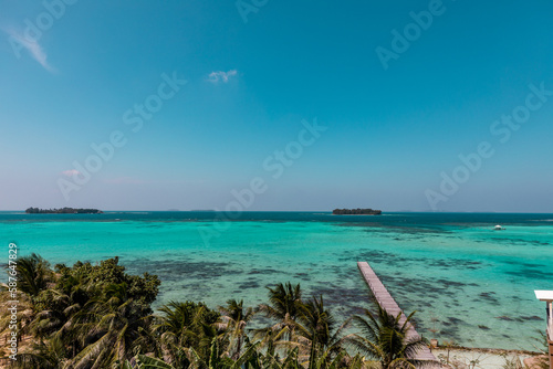 Fototapeta Naklejka Na Ścianę i Meble -  Amazing turquoise lagoon with jetty on Karimunjava tropical island, Indonesia