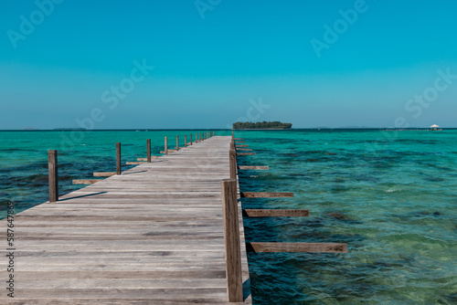 Amazing turquoise lagoon with jetty on Karimunjava tropical island, Indonesia © Piotr