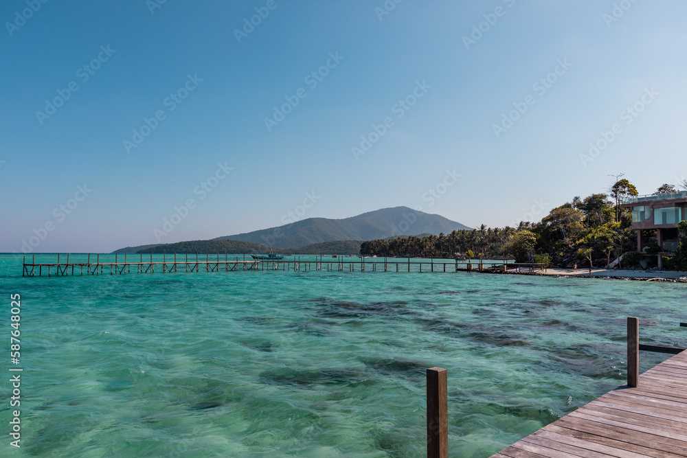 Amazing turquoise lagoon with jetty on Karimunjava tropical island, Indonesia