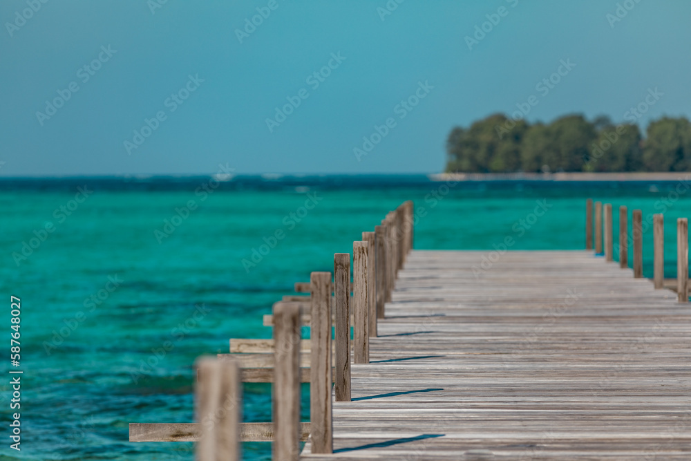 Amazing turquoise lagoon with jetty on Karimunjava tropical island, Indonesia Amazing turquoise lagoon with jetty on Karimunjava tropical island, Indonesia