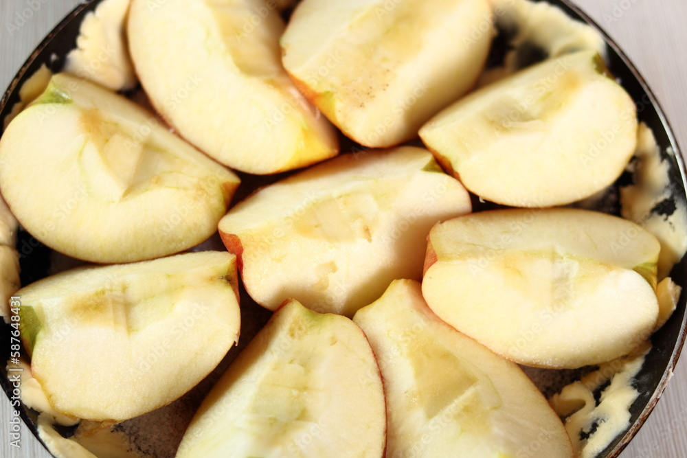Arrange apple wedges into pan, skin side down. Making Apple Tarte Tatin with Cinnamon Series. Arrange apple wedges into pan, skin side down. Making Apple Tarte Tatin with Cinnamon Series.