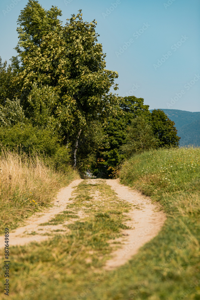 Beautiful landscape of south Poland with road in the mountains - Beskid Sadecki Mountains Beautiful landscape of south Poland with road in the mountains - Beskid Sadecki Mountains