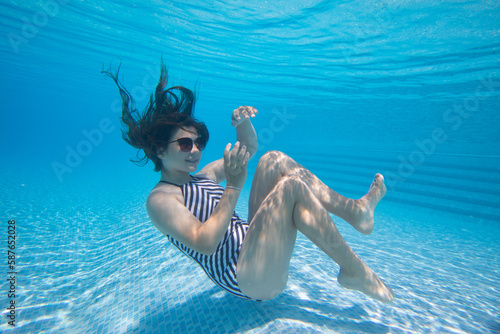 girl swimming in pool