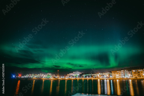 A photo of the Northern Lights over the city