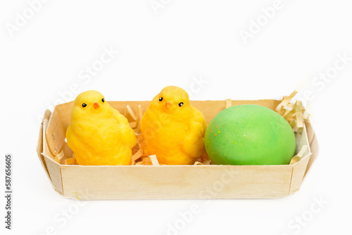 Easter soap set handmade two chickens and an egg in a wicker boat. © ALEXEY