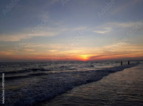 sunset on the beach © Chxnuttt