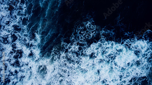 Top view dark blue sea water wave Big wave in black sea Top-down form aerial view Drone high quality camera.