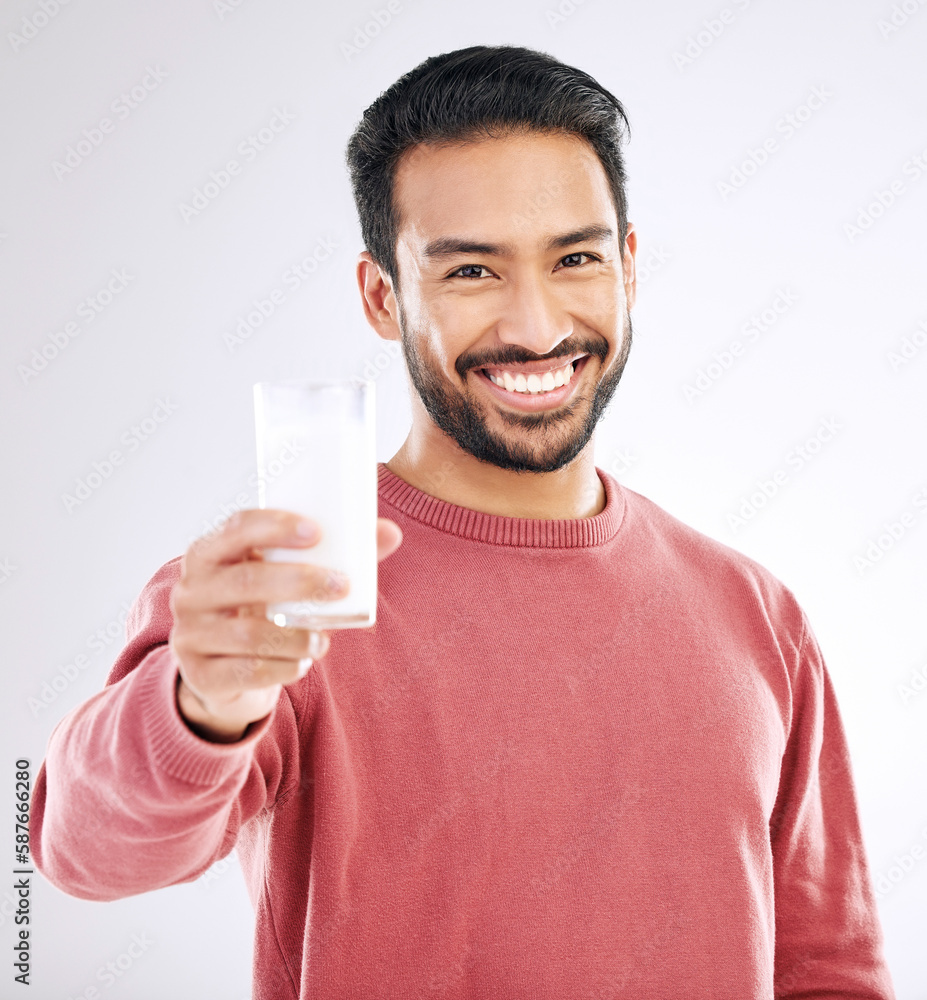 Milk, man and smile portrait with happiness in studio with calcium, healthy and nutrition drink. Isolated, white background and model feeling happy from weight loss, wellness and detox diet smoothie Milk, man and smile portrait with happiness in studio with calcium, healthy and nutrition drink. Isolated, white background and model feeling happy from weight loss, wellness and detox diet smoothie