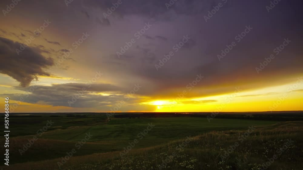 Beautiful colourful sunset at countryside fields, timelapse 4k Beautiful colourful sunset at countryside fields, timelapse 4k