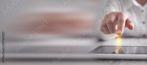 Girl using tablet. Modern office desk. Technology