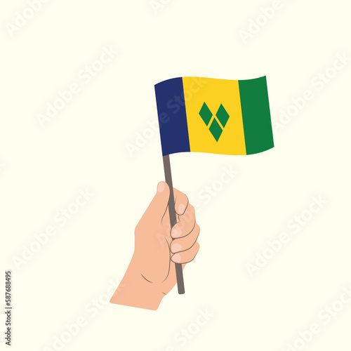 Flag of Saint Vincent and the Grenadines, Hand Holding flag photo