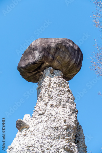 Pyramids of Zone,Cislano, Italy,.A unique form of erosion created an uncanny landscape of boulders perched atop slender columns of clay. photo