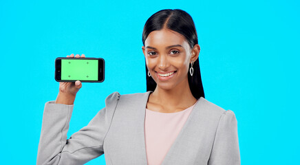 Keuken achterwand Turquoise Chroma key, green screen and businesswoman holding phone for product place, branding and mobile app advertising. Smile, happy and portrait of professional female isolated in a studio blue background  © Nina/peopleimages.com