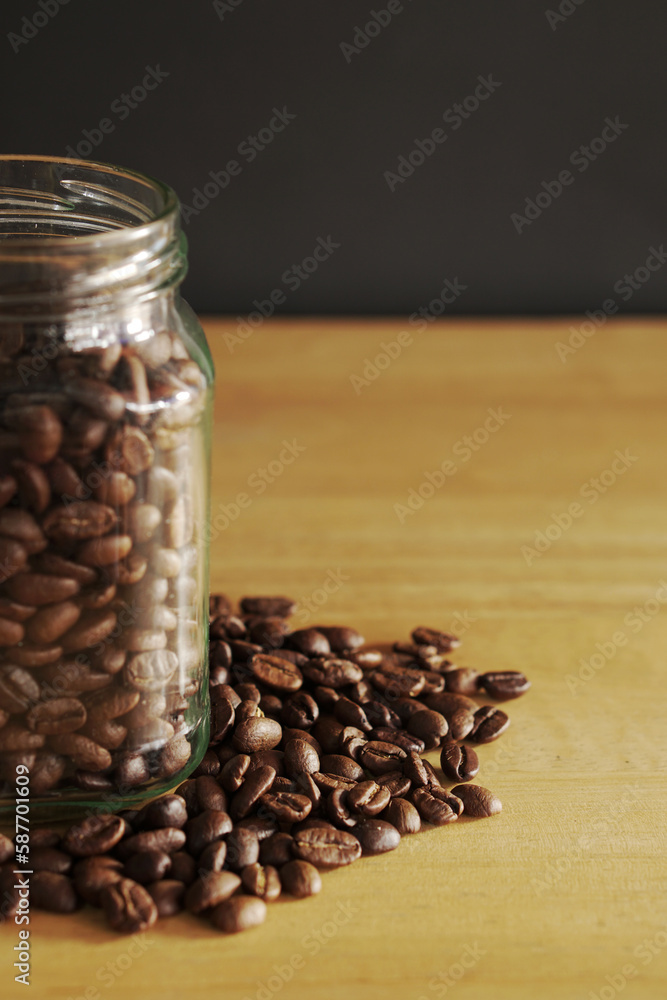 coffee beans in a glass jar coffee beans in a glass jar
