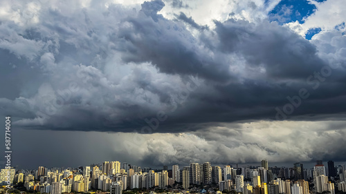 Beautiful view of a dramatic dark stormy sky. The rain is coming soon. The pattern of the clouds over the city. Very heavy rain sky in Sao Paulo city, Brazil South America.