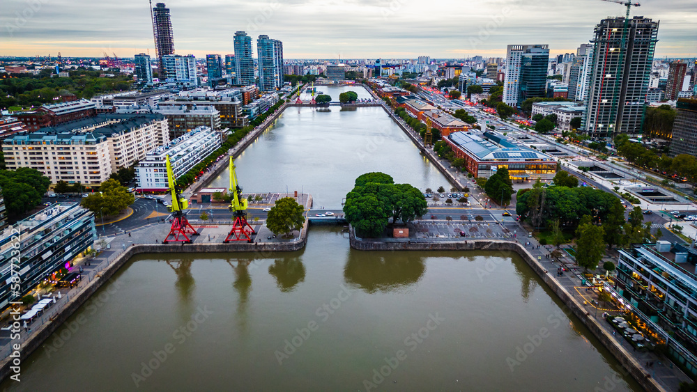 Obraz premium Aerial Drone Above Puerto Madero Skyscrapers and Woman's Bridge Buenos Aires Argentina Commercial District