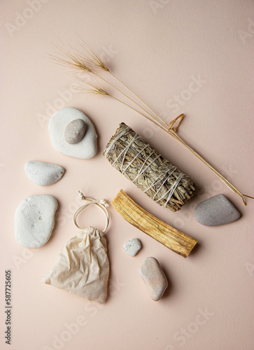 incense - a bunch of Californian white sage, palo santo stick, items for meditation and spiritual practices photo