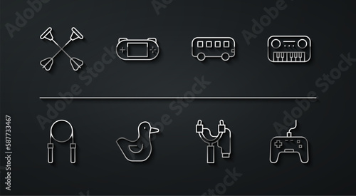 Set line Arrow with sucker tip, Jump rope, Toy piano, Slingshot, Rubber duck, Portable video game console, Gamepad and Bus toy icon. Vector