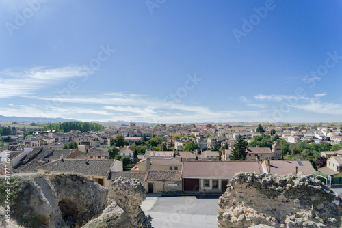 Panoramic view of the medieval village of Turegano on a spring day with blue sky. Segovia. Spain.  photo