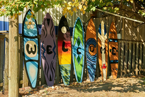 A line of colourful surf boards spelling out welcome in Toronto, Canada