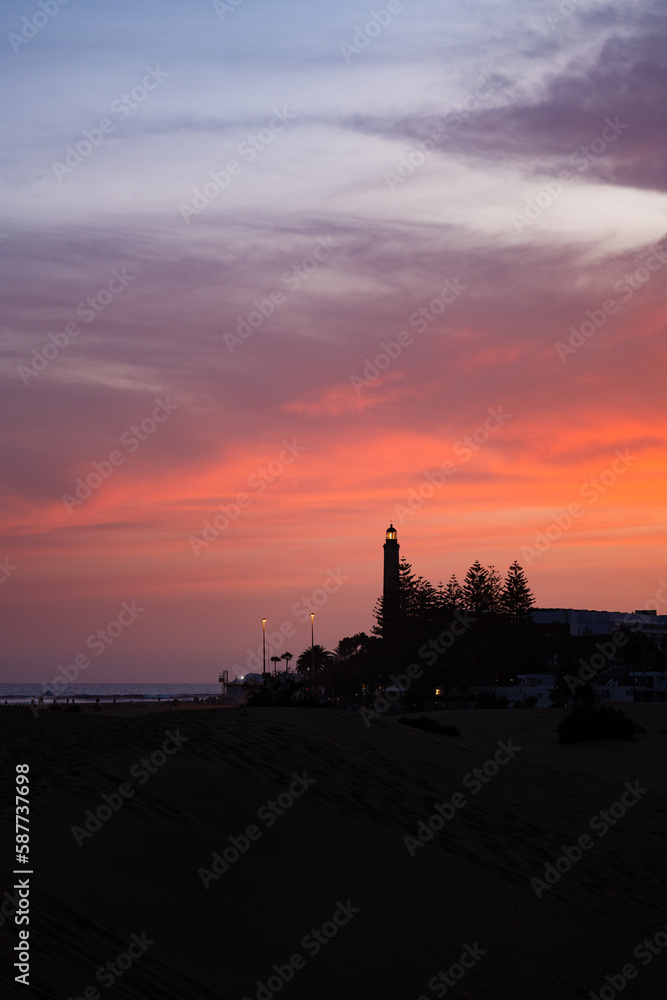 Stunning view of the Maspalomas lighthouse during a beautiful sunset. Gran Canaria, Canary Islands.