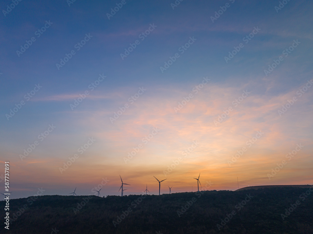 aerial view wind turbine viewpoint at Lamtakong dam,Nakhonratchasima, Thailand..amazing sky in sunrise above Lamtakong dam beautiful reflection on the large pond..Gradient color. Sky texture, . aerial view wind turbine viewpoint at Lamtakong dam,Nakhonratchasima, Thailand..amazing sky in sunrise above Lamtakong dam beautiful reflection on the large pond..Gradient color. Sky texture, .