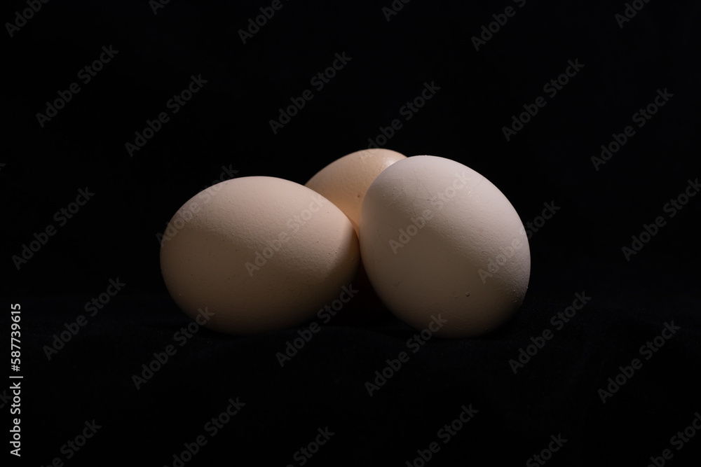 Eggs on the black background Eggs on the black background