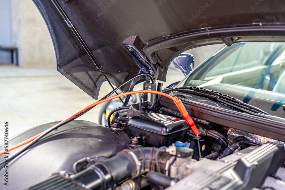 charging the car battery using electric cables charging the car battery using electric cables