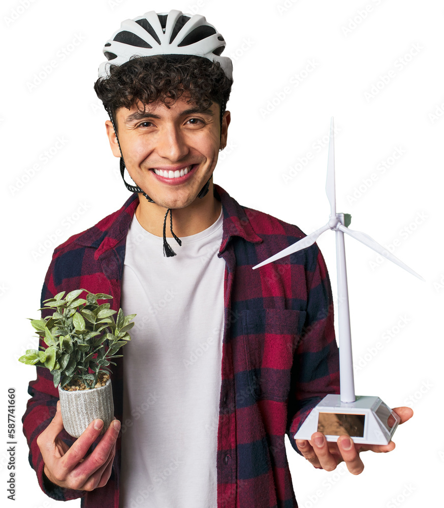 Advocating for clean energy: young man holding a plant and a small ...