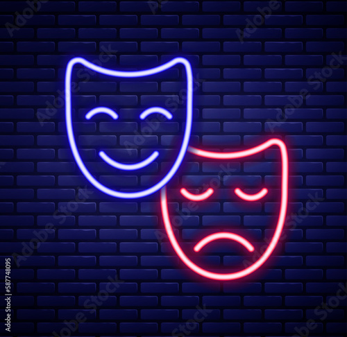 Glowing neon line Comedy and tragedy theatrical masks icon isolated on brick wall background. Colorful outline concept. Vector