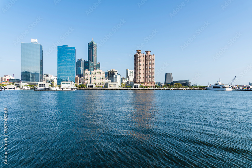 Fototapeta premium Panoramic view of the modern building along the Glory Pier in the port of Kaohsiung, Taiwan. such as 85 Sky Tower and Kaohsiung Port Cruise Terminal.