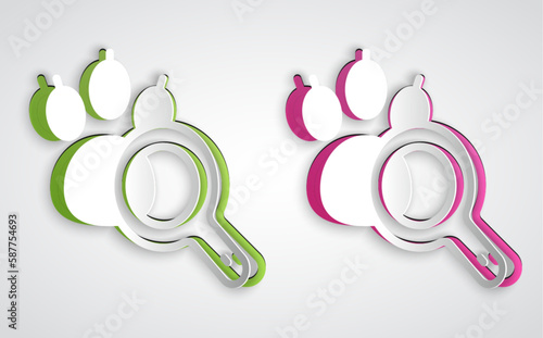 Paper cut Paw search icon isolated on grey background. Magnifying glass with animal footprints. Paper art style. Vector