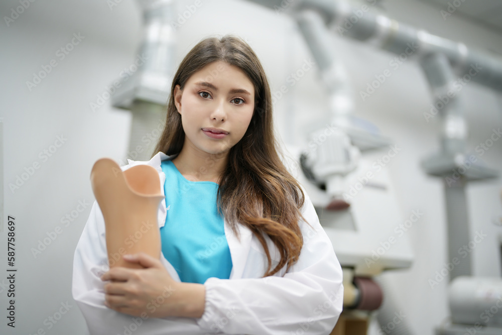 Orthopedic technician adjusting prosthetic leg for disabilities people Orthopedic technician adjusting prosthetic leg for disabilities people