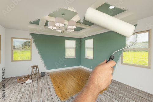 Before and After of Man Using A Paint Roller to Reveal Newly Remodeled Room with Fresh Muted Teal Paint, Coffered Ceiling and New Floors. photo